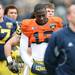 Michigan quarterback Devin Gardner stands during the National Anthem before the spring practice at Michigan Stadium on Saturday, April 13, 2013. Melanie Maxwell I AnnArbor.com